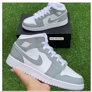 Grey and white nike air jordans